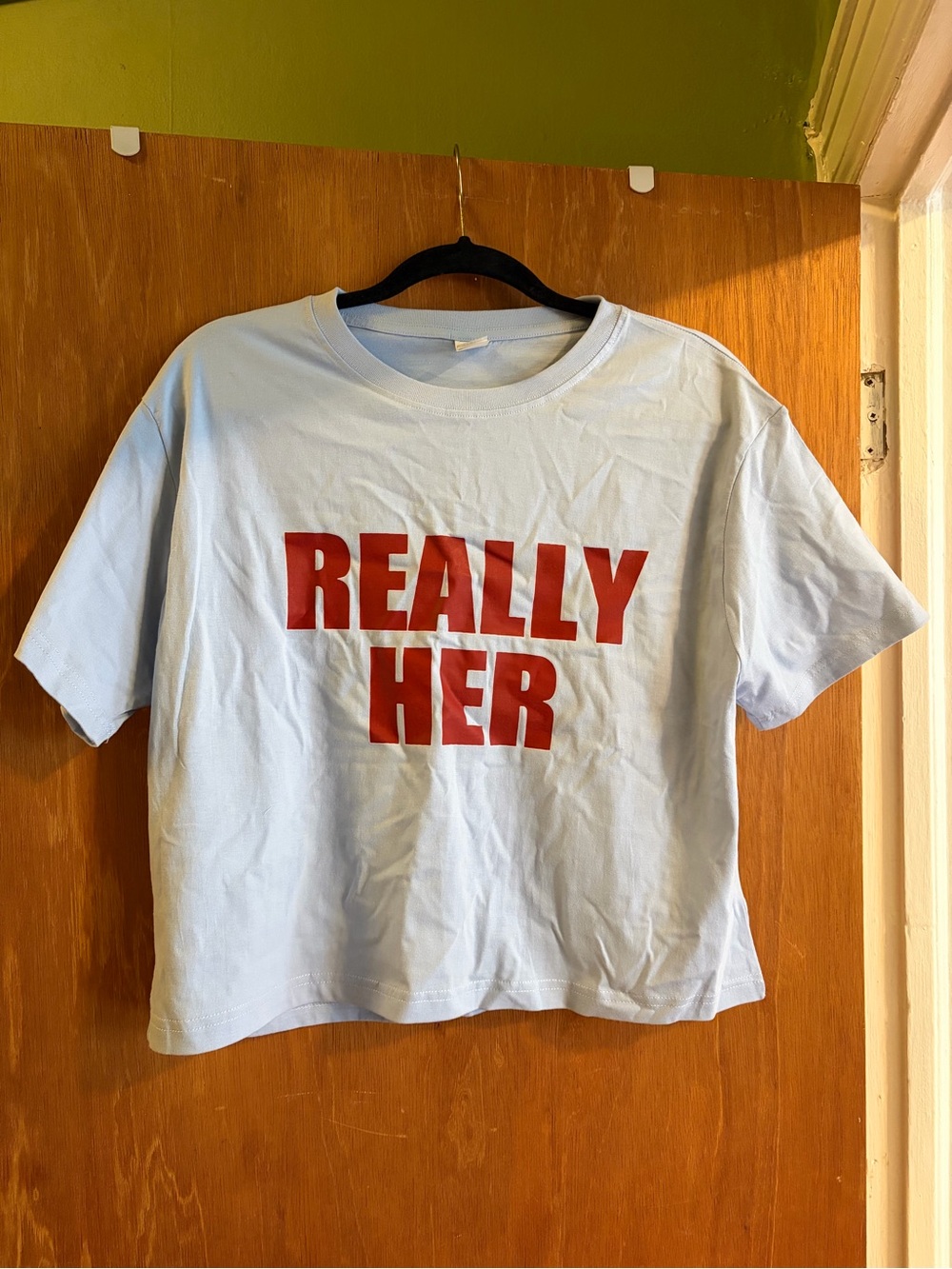 Light Blue Short Sleeve Crop Tee with Red 'REALLY HER' Print